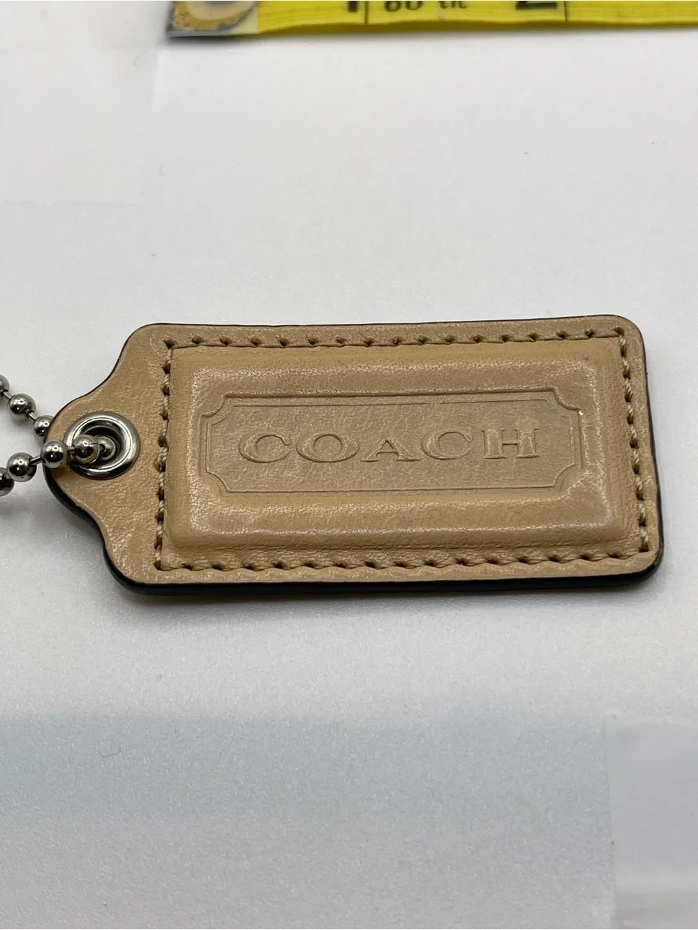 COACH Leather Hang Tag - Beige